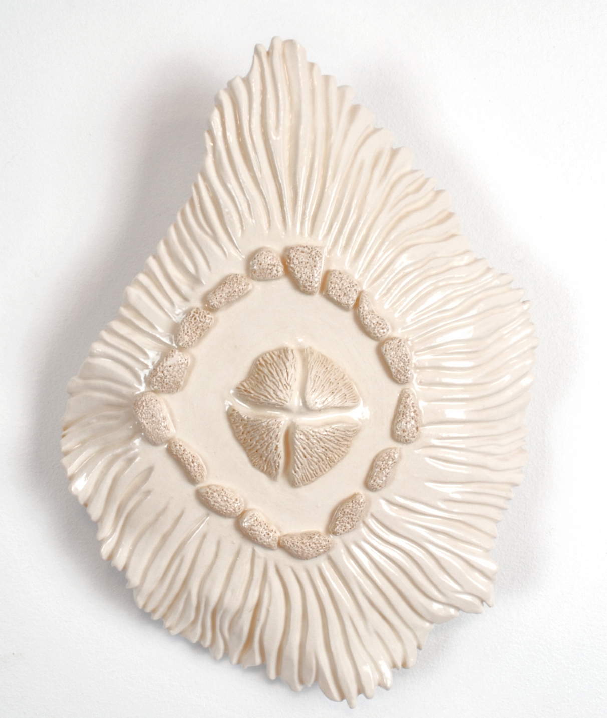 Detailed ceramic wall sculpture depicting the cellular structure of a Spanish Moss as seen through a micrograph, with an emphasis on organic forms, intricate patterns and textures. 
